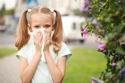 Little girl suffering from seasonal allergies