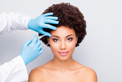 Woman undergoing Botox injection for wrinkle reduction and facial rejuvenation