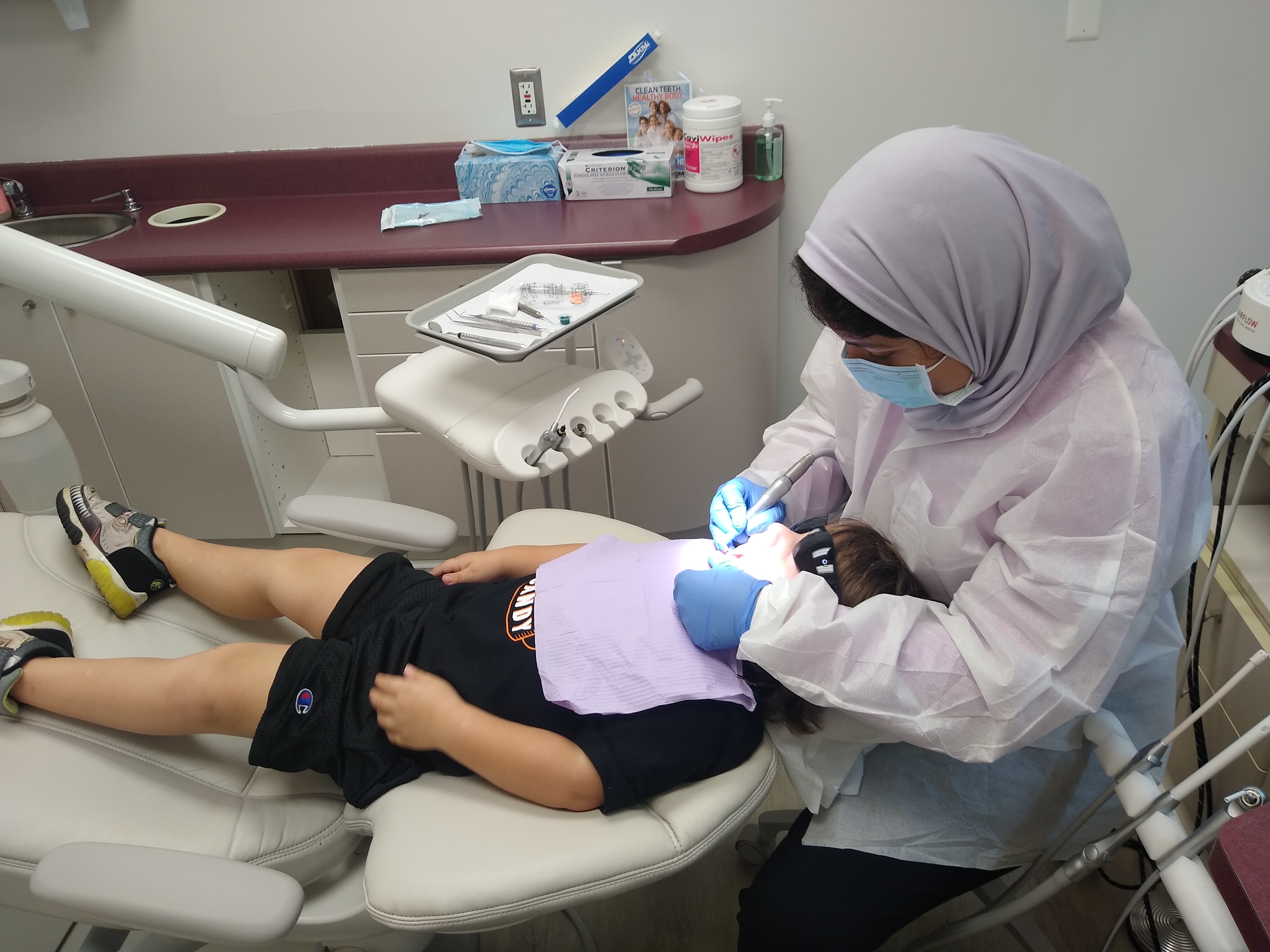 Kenny getting his teeth cleaned! He loves Dr. Ismail!