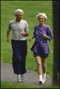 Elderly couple running together