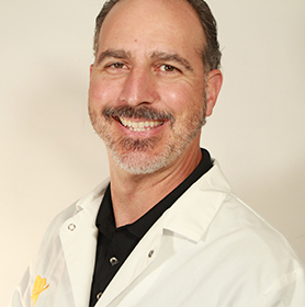 portrait of Dr. John Tsaknis, DDS - dentist Washington DC