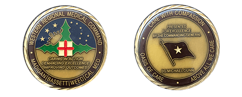 Two coins that Dr. Abedi was awarded