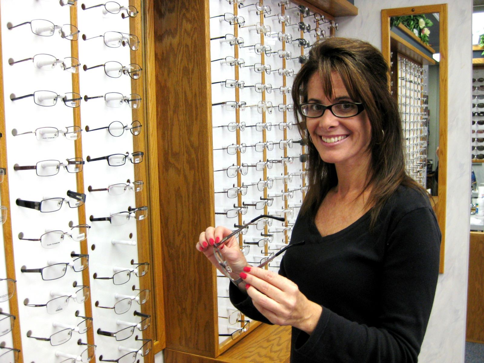 Woman Picking Out Frames