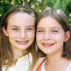Two teen girls with braces